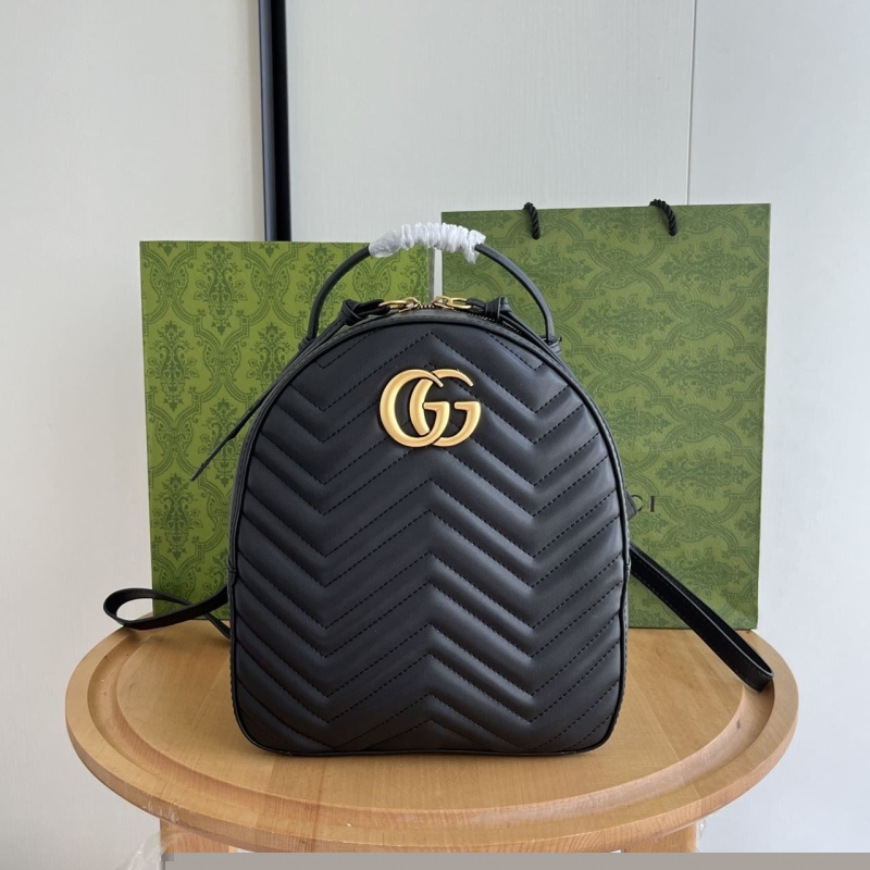 G*u*i backpacks